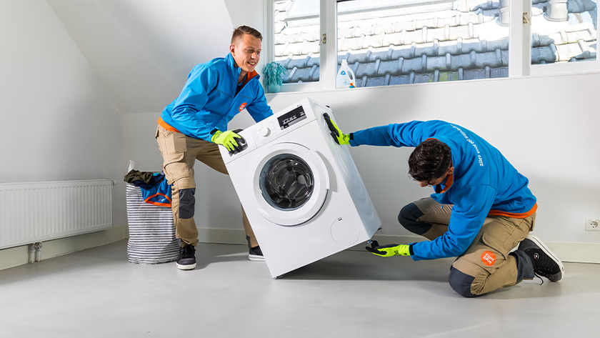 mosógép elszállítás ingyen csapata munka közben